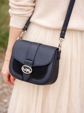 coach navy blue saddle bag used but in good condition